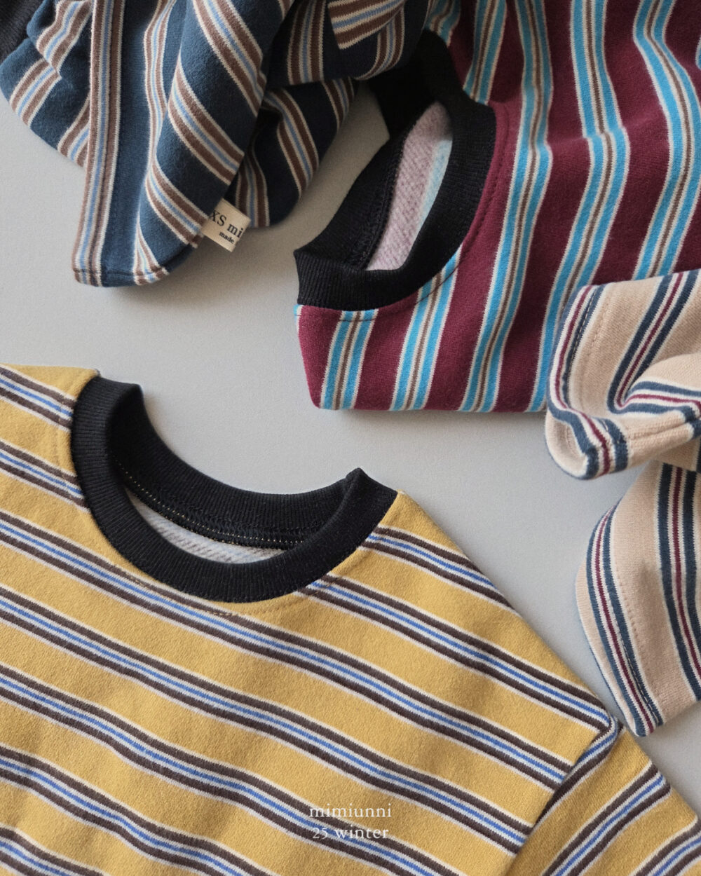 25WIN 條紋長袖上衣 任兩件折NT.50