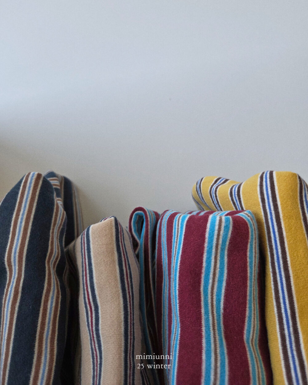 25WIN 條紋長袖上衣 任兩件折NT.50