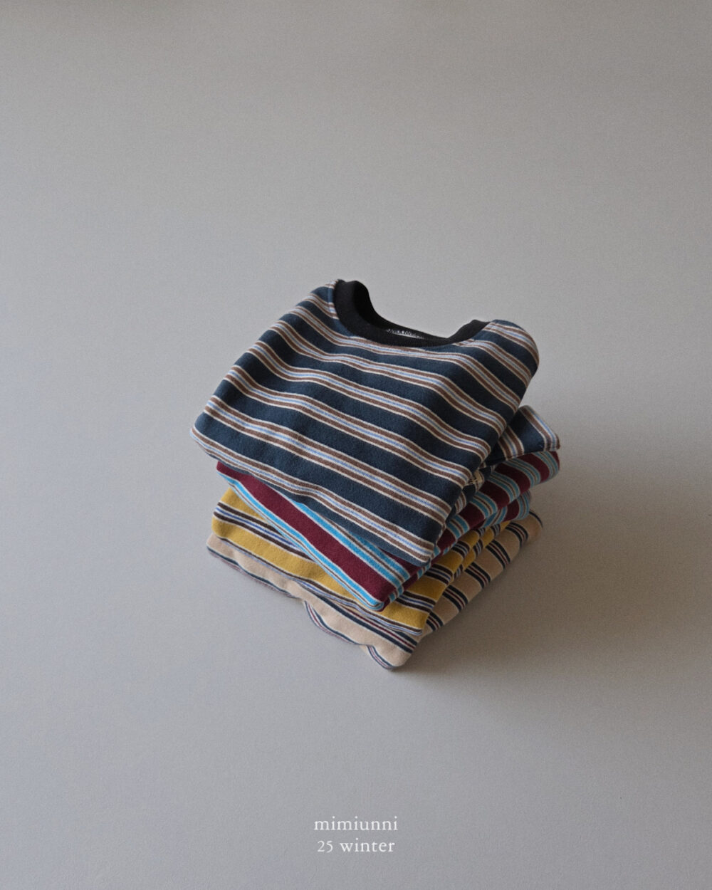 25WIN 條紋長袖上衣 任兩件折NT.50