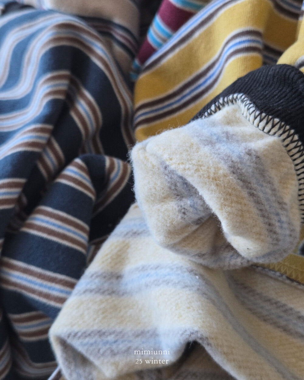 25WIN 條紋長袖上衣 任兩件折NT.50