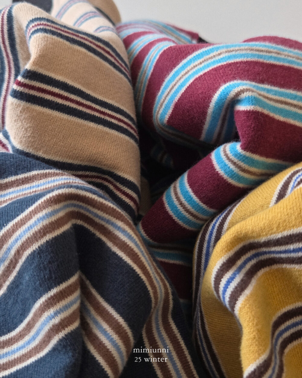 25WIN 條紋長袖上衣 任兩件折NT.50